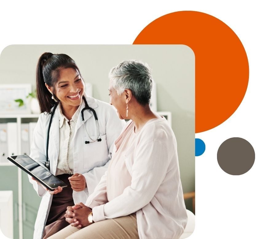 breast cancer surgeon consulting patient on surgery options