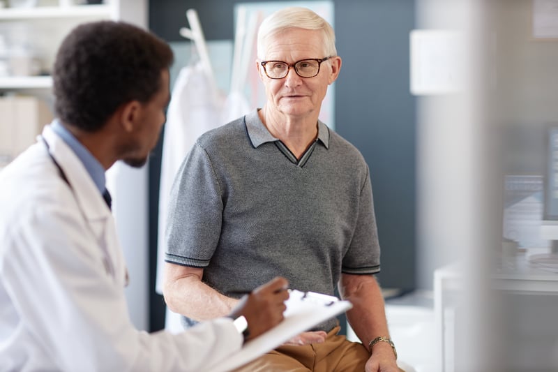 senior-man-talking-to-doctor-in-consultation-expla-2026-03-09-01-52-34-utc