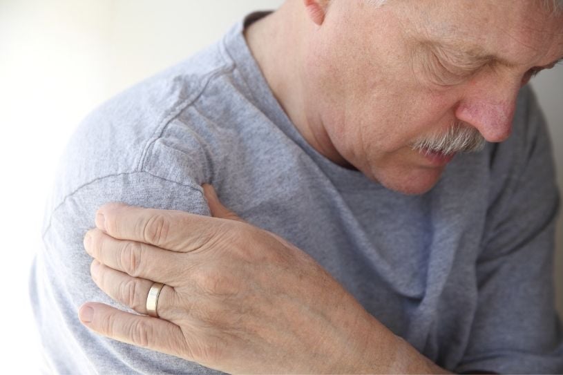 man with shoulder pain - surprising Signs and Symptoms of Lung Cancer - compass oncology